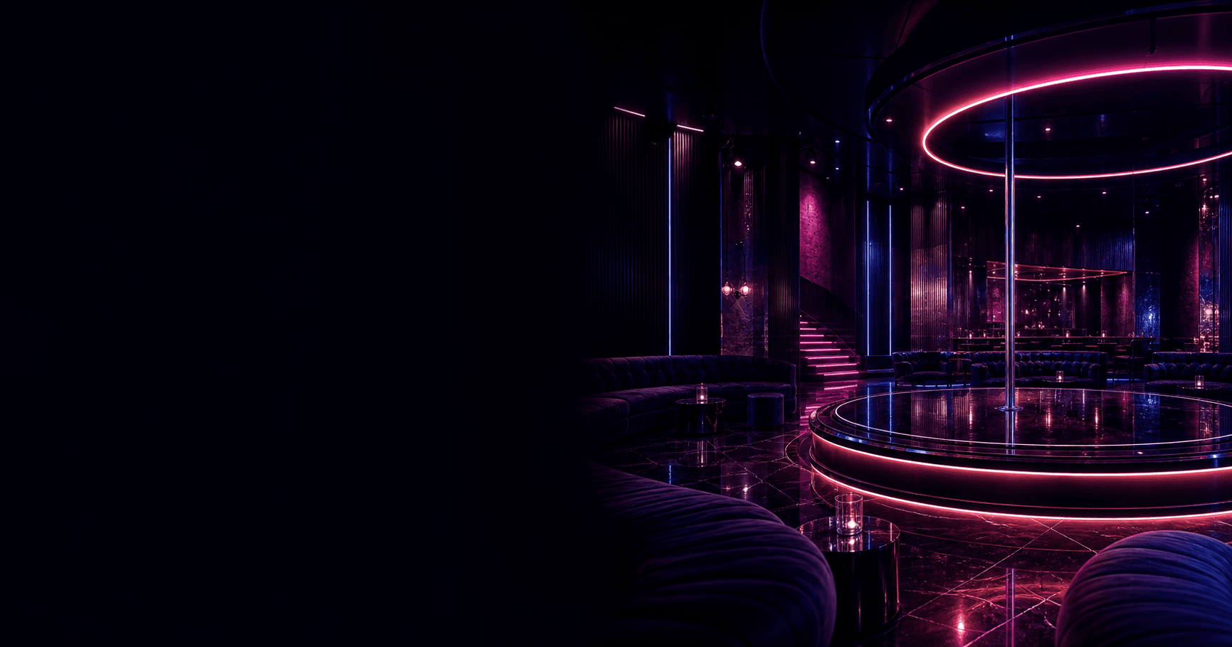 The XS lounge and seating area lit in neon